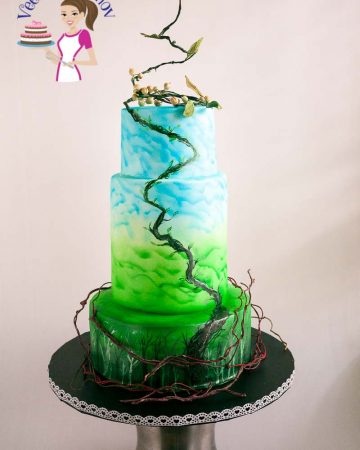 A cake decorated in a Jack and the Beanstalk theme.