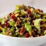 Celery salad in a bowl with nuts.