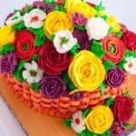 A cake decorated like a basket of flowers.