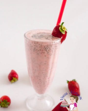 A glass of strawberry and banana milkshake.
