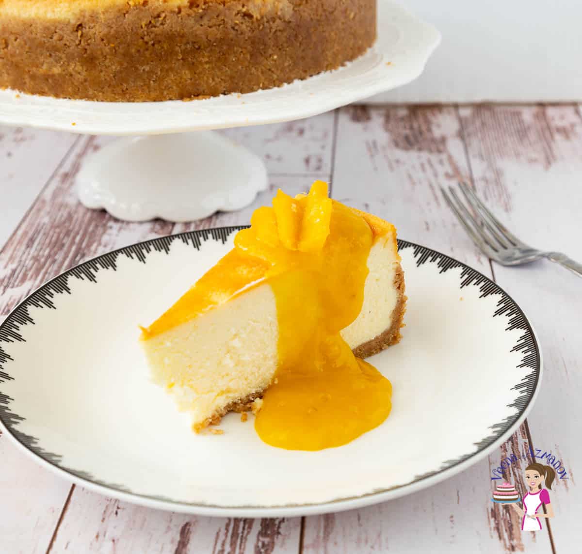 A slice of mango cheesecake on a plate.