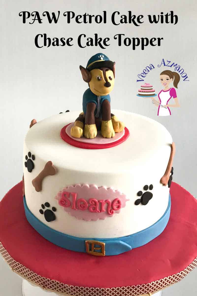 A birthday cake with a Paw Patrol topper.