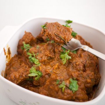 Beef curry in a serving dish.
