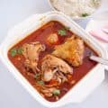 chicken curry  in a serving dish.