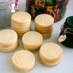 Stacks of shortbread cookies on a table.