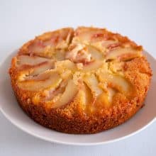 An inverted fruitcake with peaches.