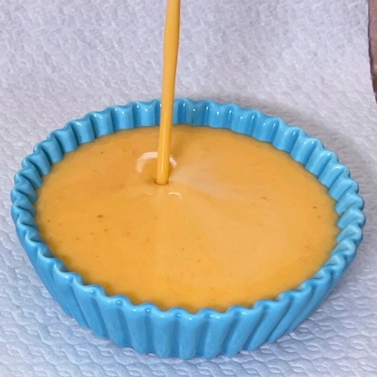 A remekin with apricot creme brulee for baking.