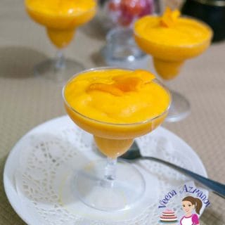 Mango mousse in a glass.