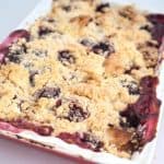 Baking tray with fruit crumbles.