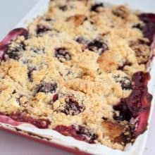 Baking tray with fruit crumble recipe.