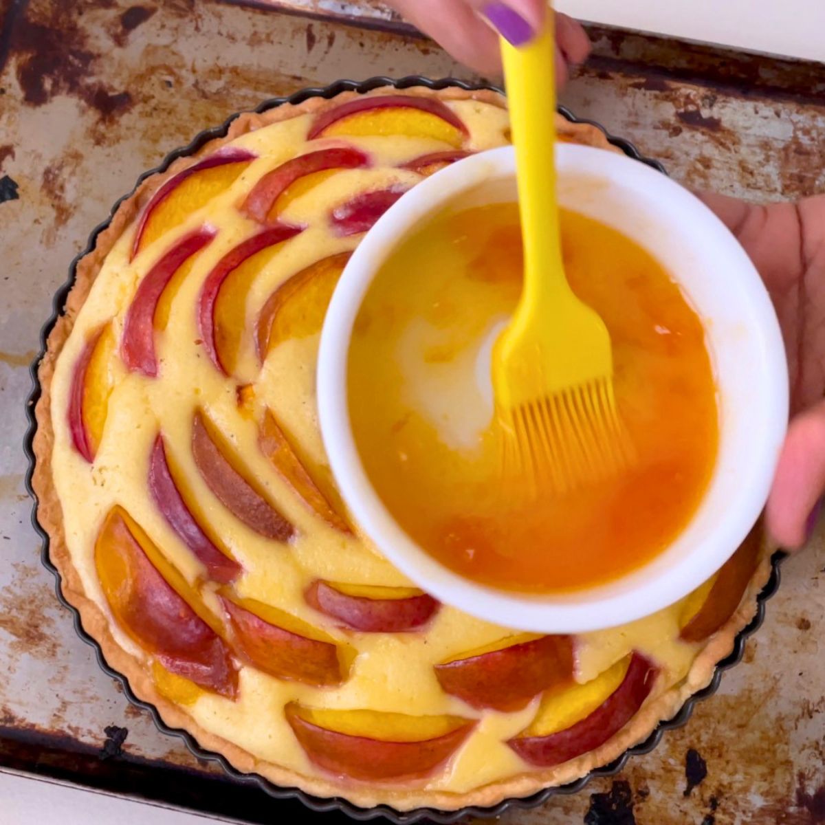 Nectarine tart brushed with apricot glaze.