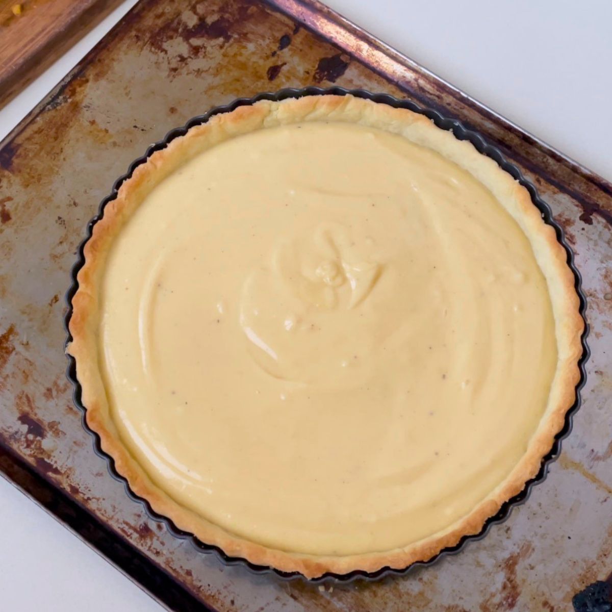 Cream cheese filling in a shortcrust tart.