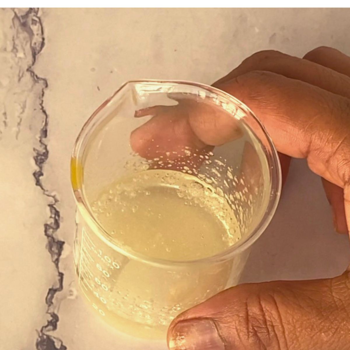 Gelatin in a small measuring cup.