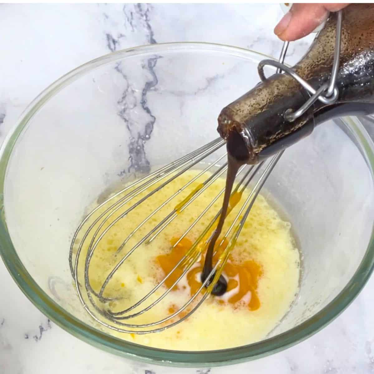 Combine wet ingredients for the mango cake.