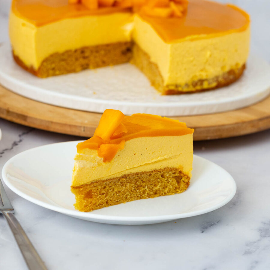 A slice of mango mousse cake.