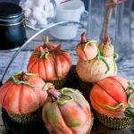 Pinterest image for fondant decorated pumpkin cupcakes.