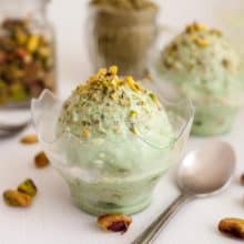A bowl with no churn ice cream and pistachios.