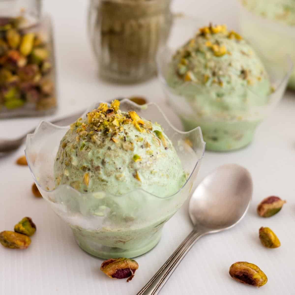 Two bowls with green tea ice cream.