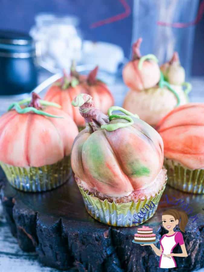 Cupcakes decorated like pumpkins.