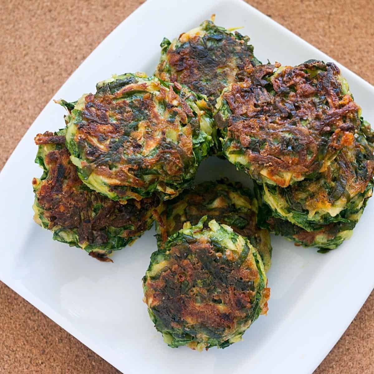 A stack of patties made with spinach and potatoes.