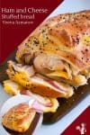 A sliced ham and cheese stuffed bread.