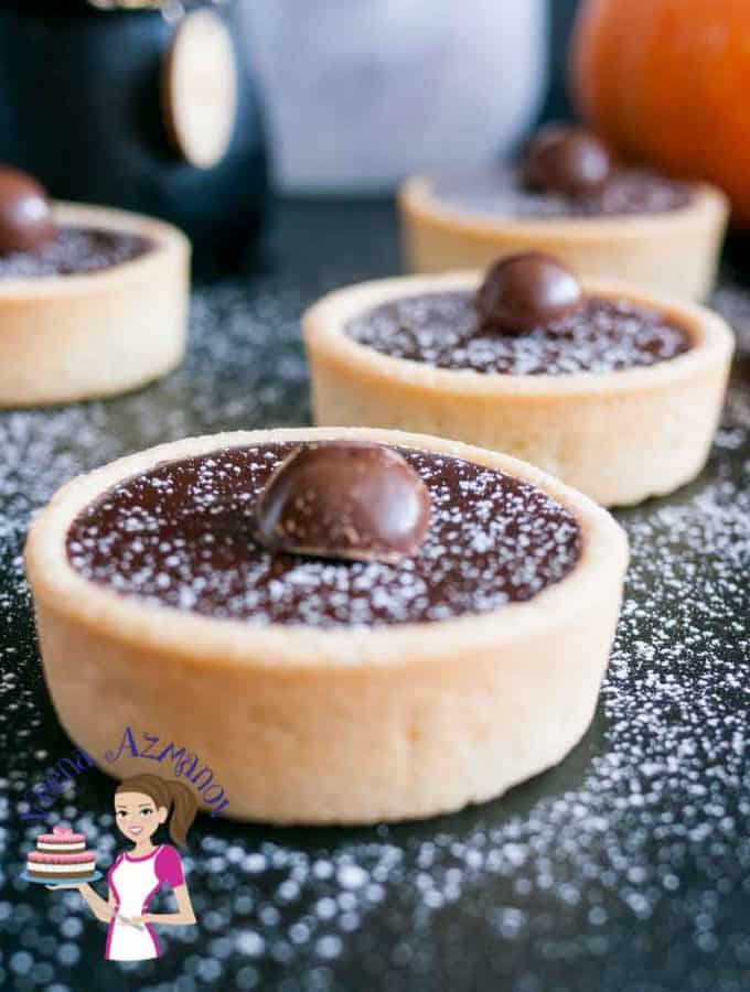 These pumpkin pie chocolate tarts make an exotic dessert table in fall or anytime of the year. With rich flavors like cinnamon, nutmeg and ginger these are bound to warm you up while you indulge in the heavenly chocolate filling that just melts in the mouth. 