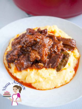 A plate of slow cooked lamb with polenta.