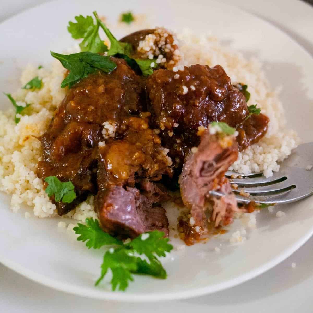 Beef burgundy served over couscous.