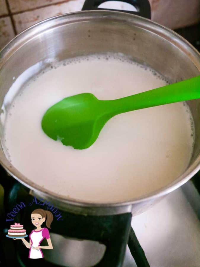 A mixing bowl with cream.