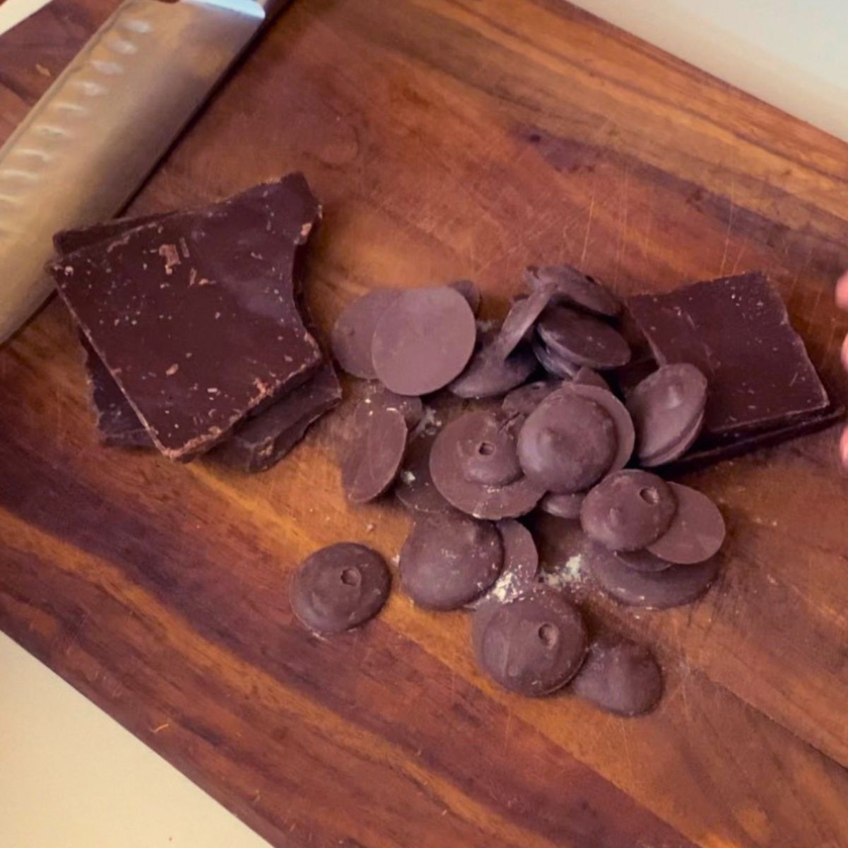 Chopping the chocolate for cookies.