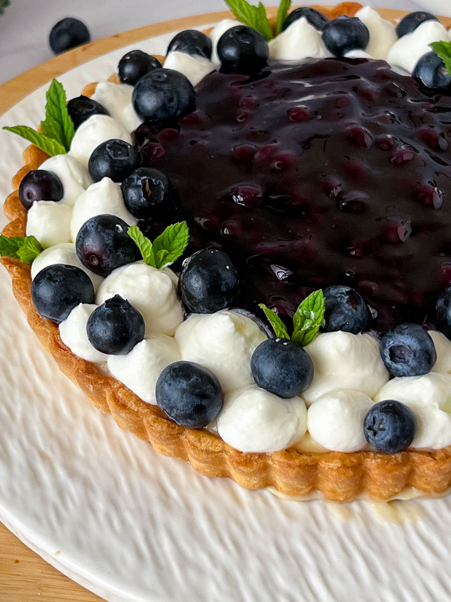 Close up of the blueberry tart with fresh blueberries,
