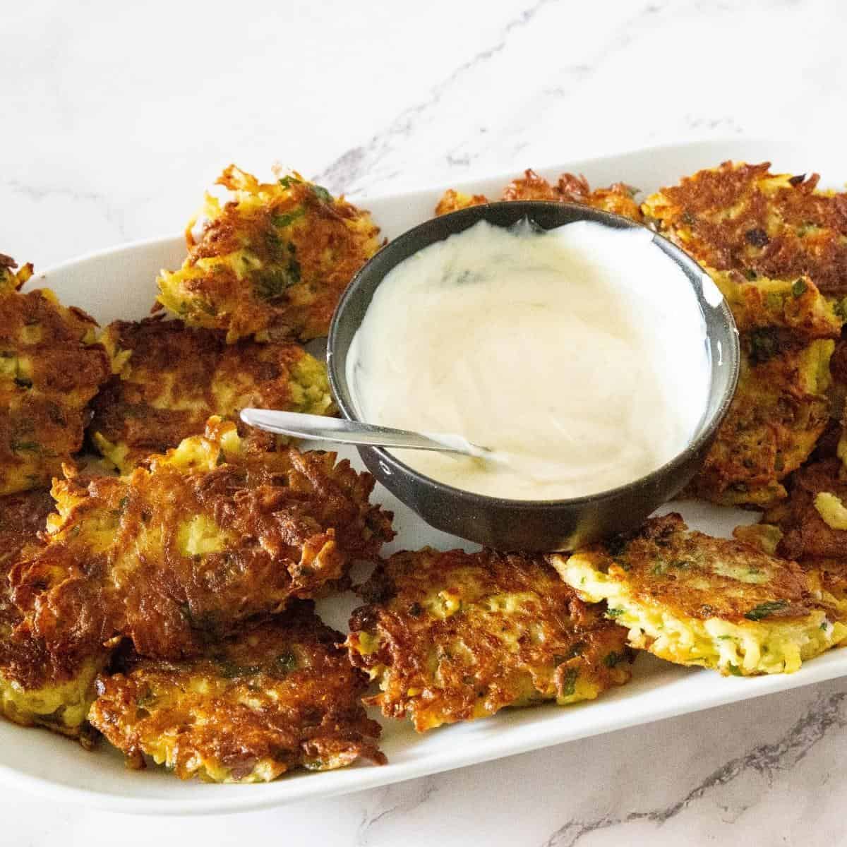 A platter with latkes and dip.