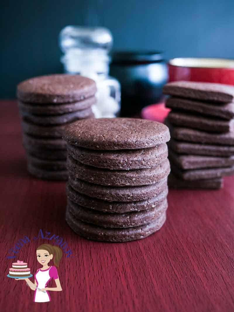 A stack of chocolate cookies on a table.
