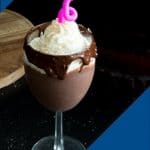 A wine glass with chocolate eggnog