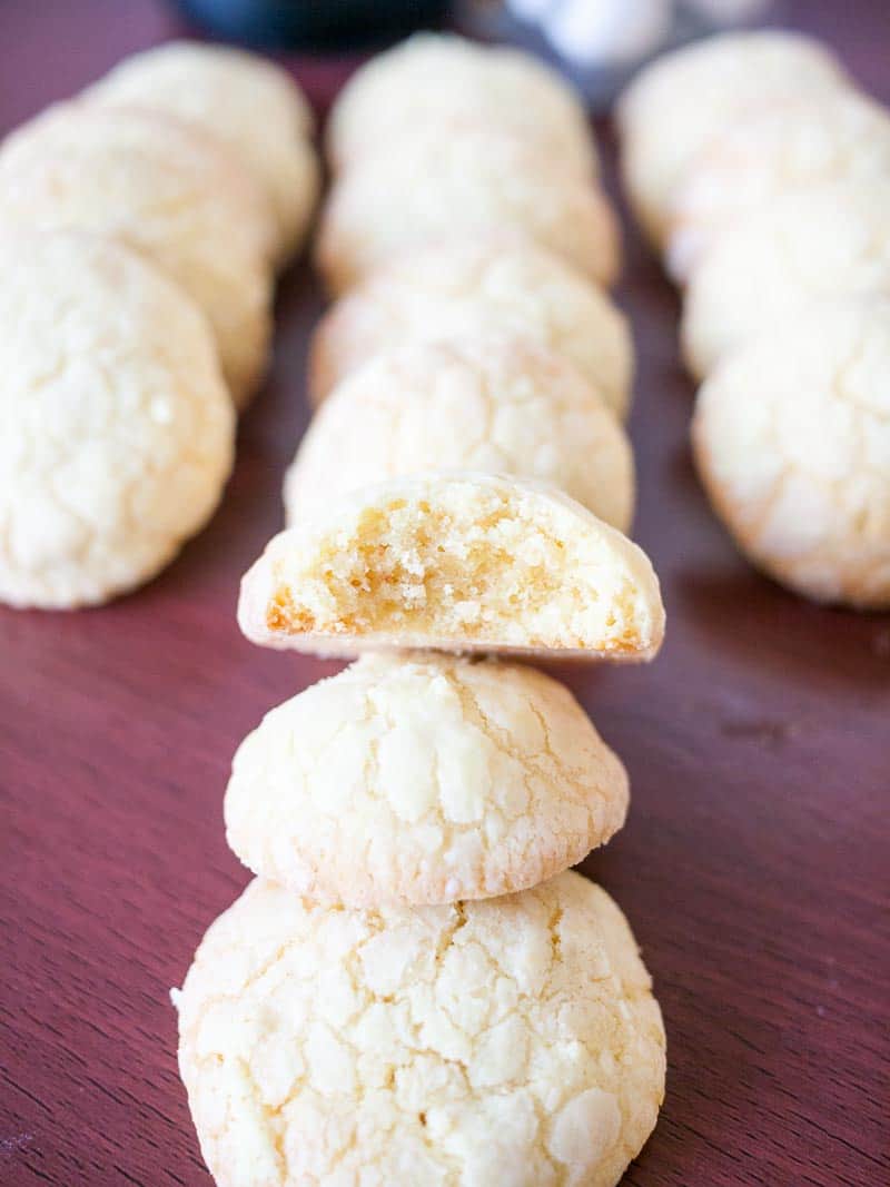 A stack of lemon cookies on a table.