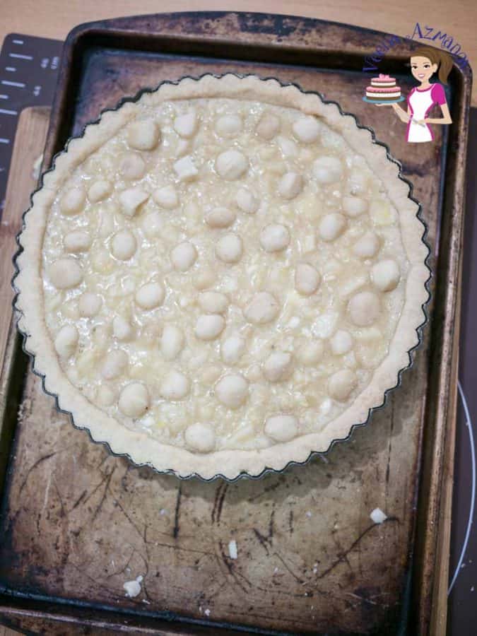 A pan with unbaked macadamia tart.