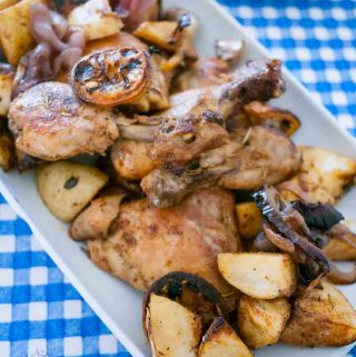 This sheet pan shawarma chicken takes advantage of the popular middle eastern shawarma spice mix to add flavor and dimension to your weekday sheet pan recipe.ย This simple, easy and effortless recipe gets done in an hour. It's hearty and healthy with flavorful chicken, roast potatoes, caramelized onions, lemon and garlic.