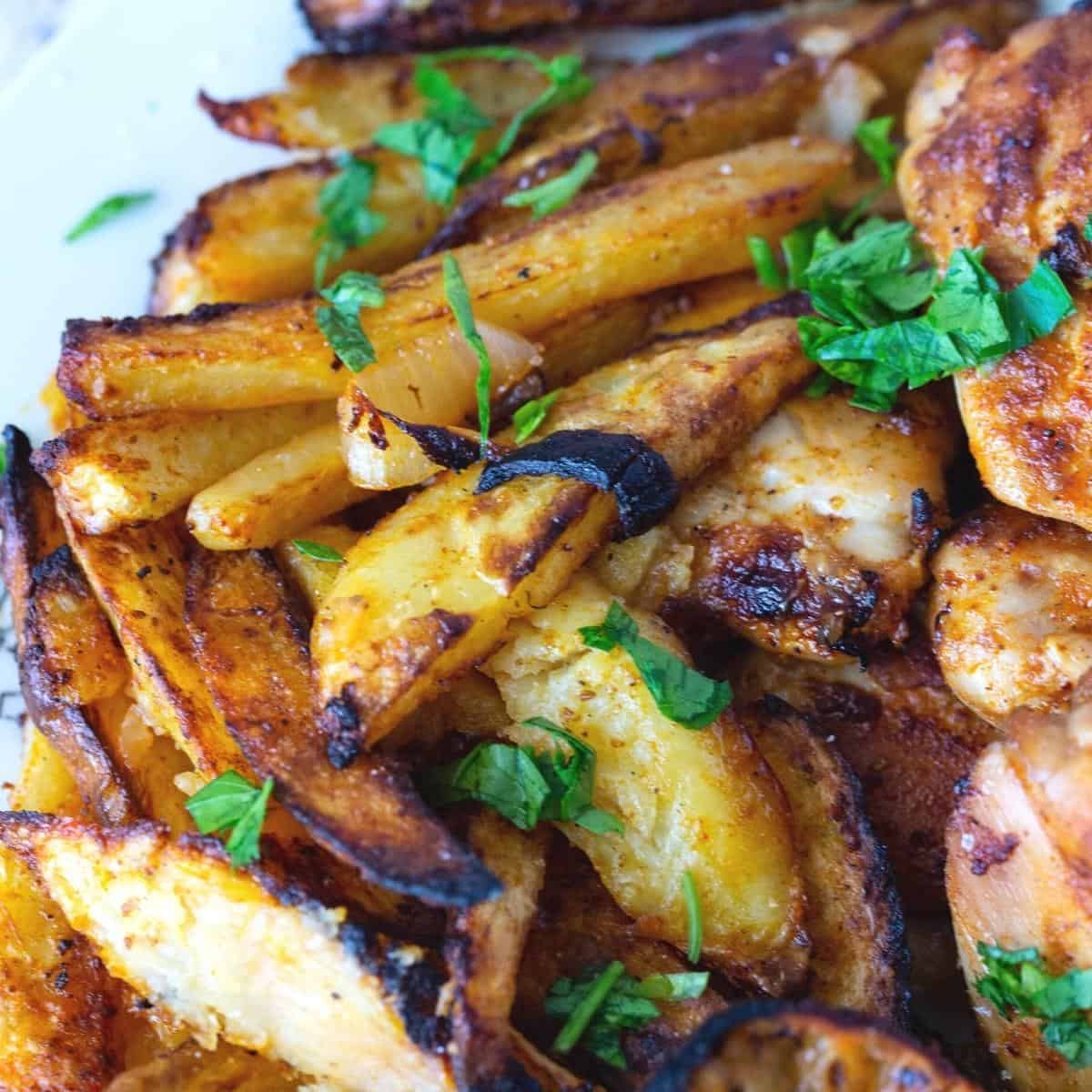 Roasted potatoes on the plate.