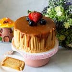 A cake with butterscotch drip.
