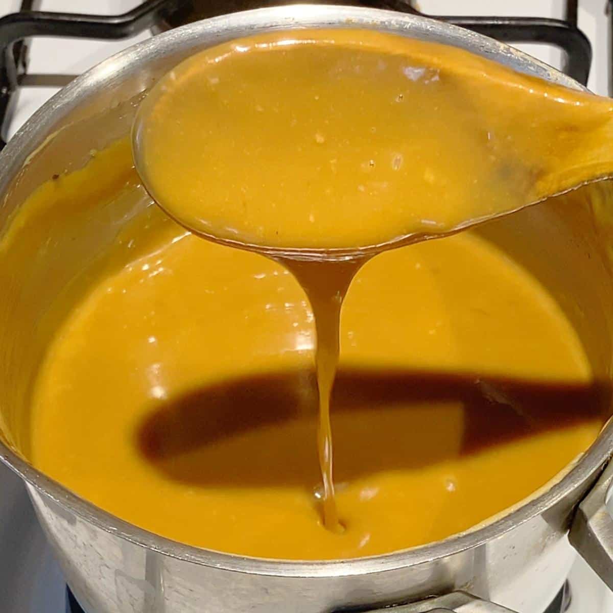 A saucepan with caramel.