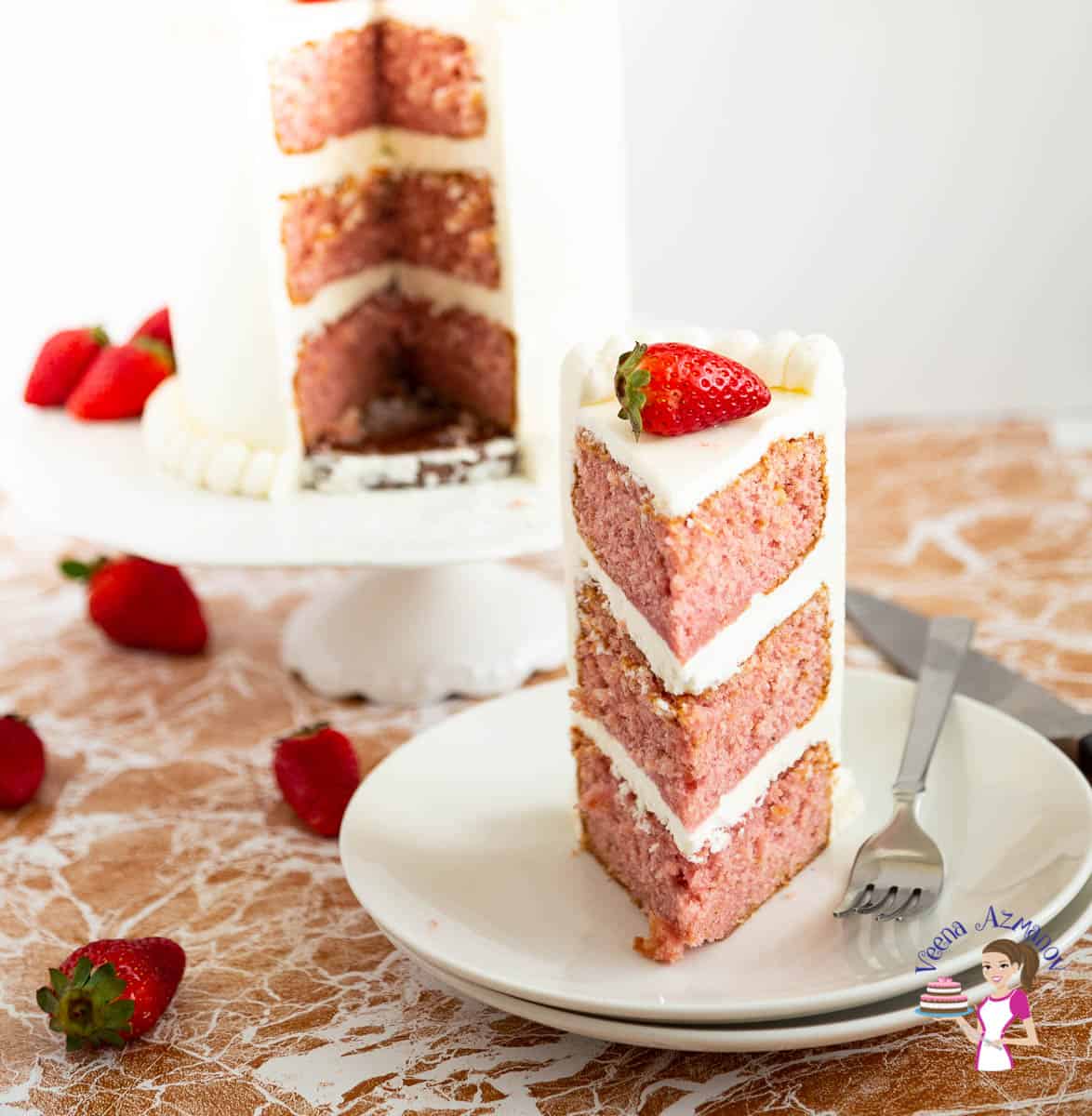 A sliced strawberry cake