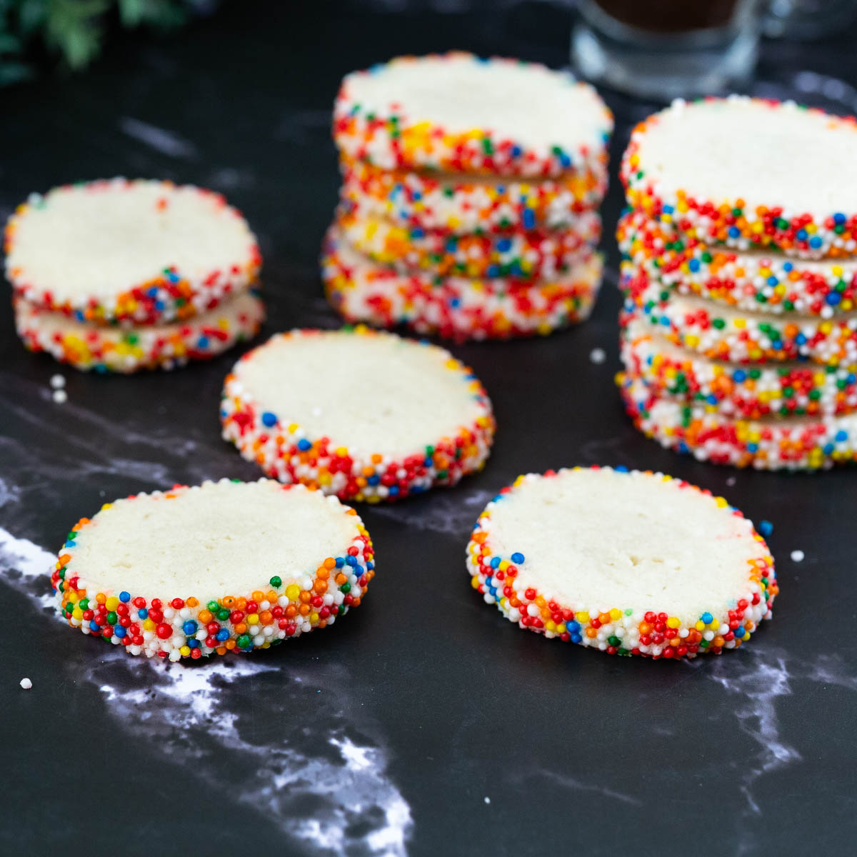 Sprinkle cookies on the table.