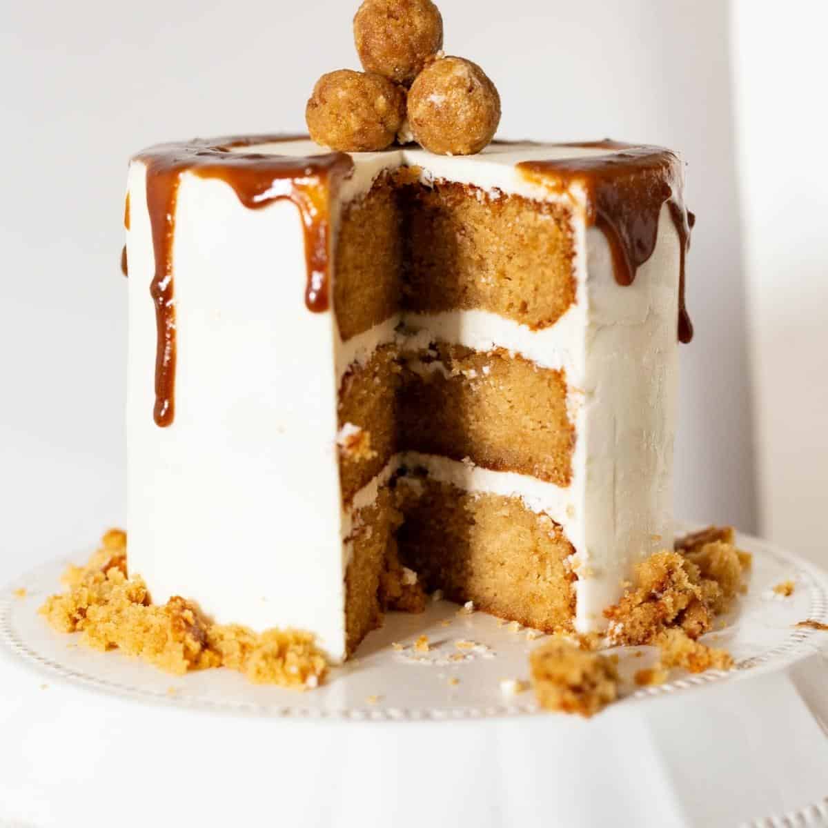 A slice cake on a cake stand.