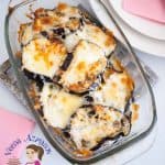 A dish of baked eggplant with Parmesan cheese.