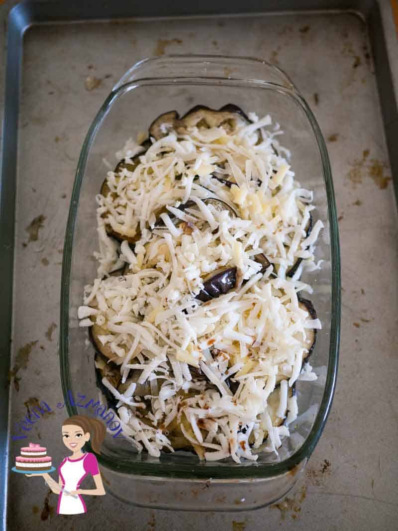 A baking dish of eggplant with Parmesan cheese.