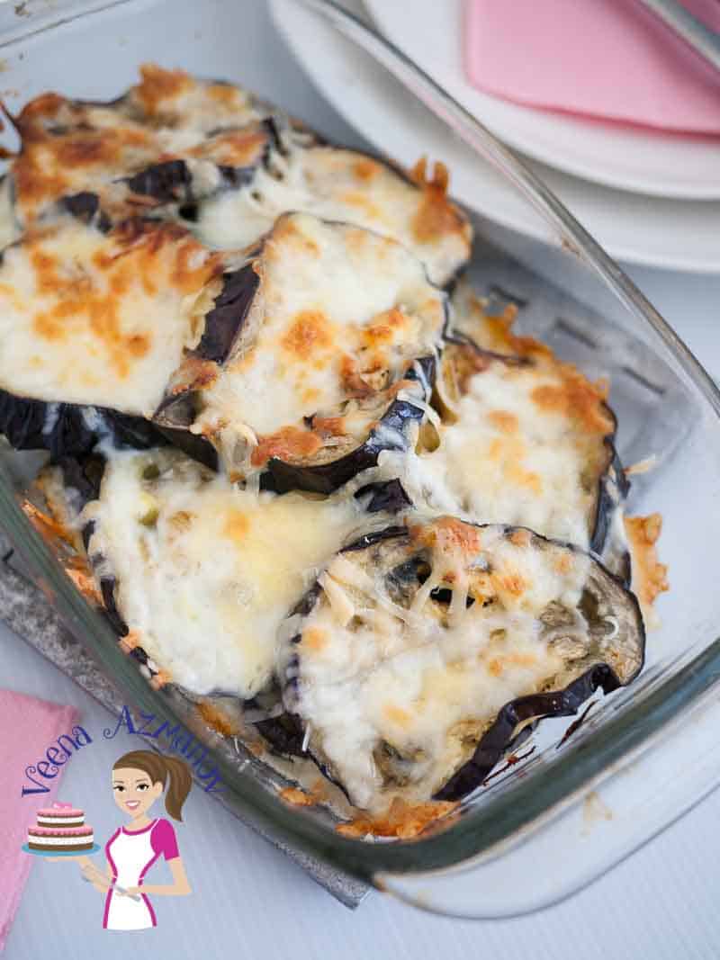 A dish of baked eggplant with Parmesan cheese.