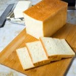 Sliced pullman bread on a wooden board