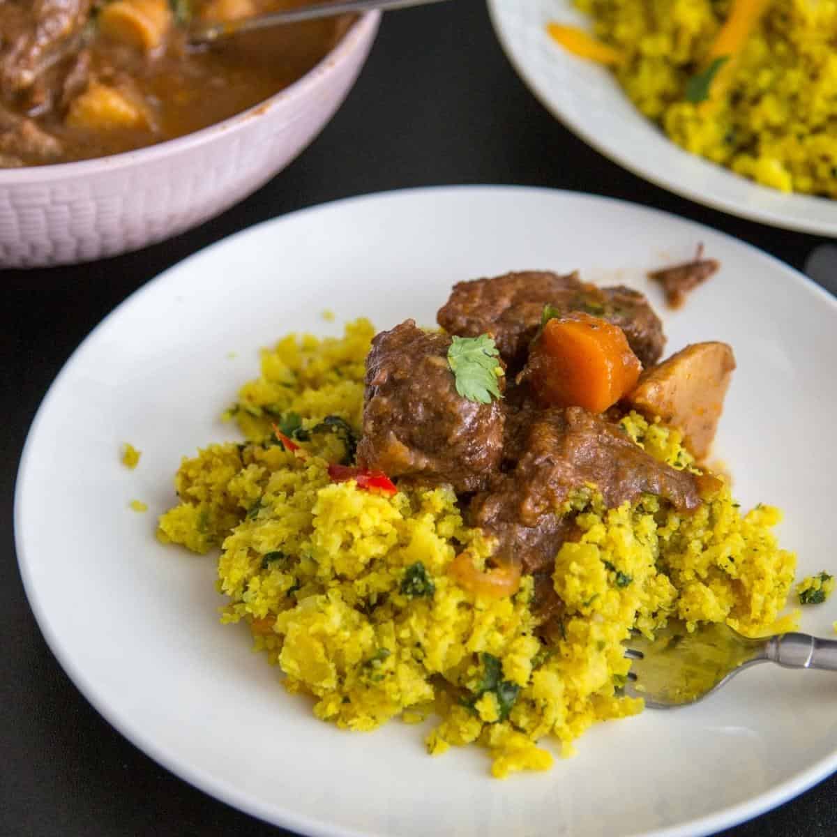 Cauliflower rice pilaf with turmeric in a bowl