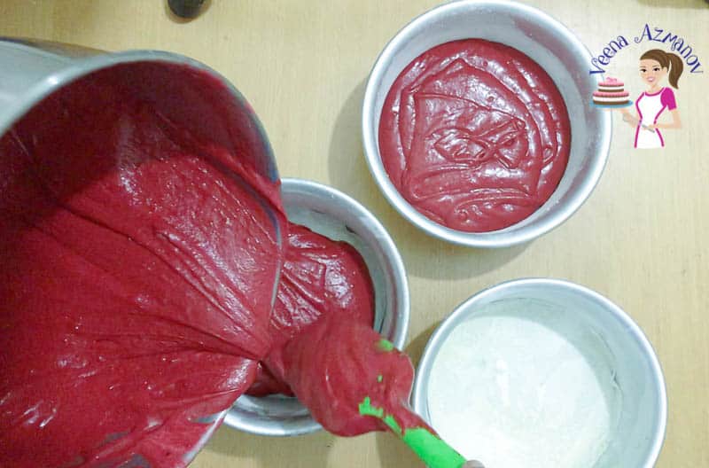 Pour the red velvet batter into the cake pans