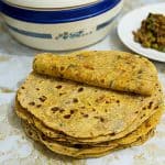 A stack of flatbread with sweet potato.